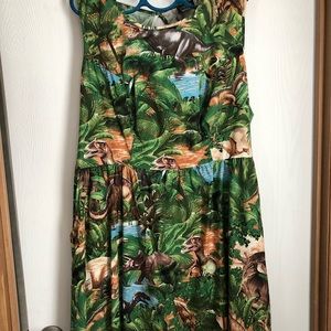 Retrolicious, bought through ModCloth, dinosaur dress, size 3X. Has pockets.